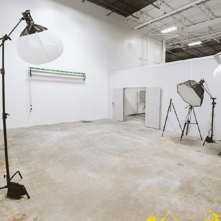 Photo studio for rent set up for capturing photo and video at Shift with roll down back drops, constant lights, tripods, and more.